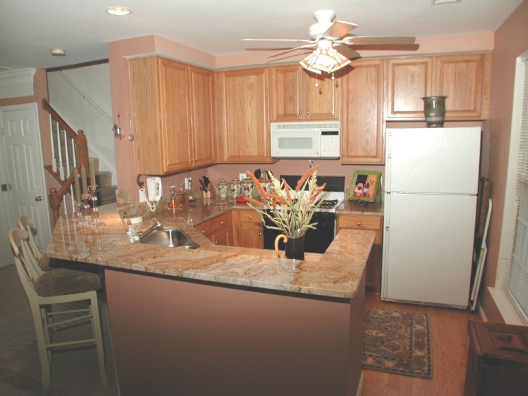Kitchen Virtual Tour: 42" Oak cabinets, upgraded new hardwood floor and look at these gorgeous Italian Granite counter-tops. All high-quality GE appliances: 4-Burner Gas Range and built-in spacesaver Microwave Oven, 20.6cuft. Refrigerator with Icemaker and Dishwasher.